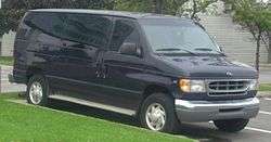 Black van parked in a parking lot