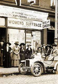 1910 image of half a dozen ladies outside a suffrage campaign shop
