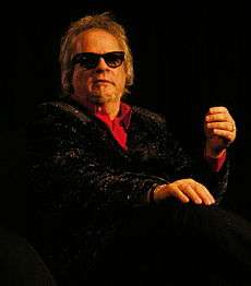 Al Kooper seated