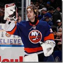 Al Montoyo skating with the Islanders with his goaltender mask off.