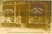 Armand at his parent's radio store (5 Years old)