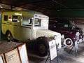 Bletchley Park Garage Austin 18 and Land Rover Ambulances.jpg