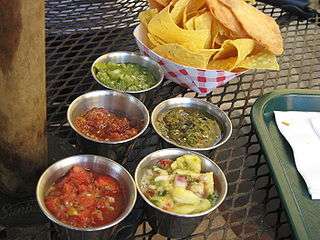 Tortilla chips and several salsas