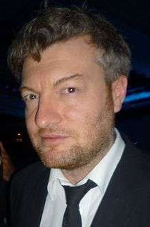 Head-and-shoulders colour photograph of Charlie Brooker in 2011.