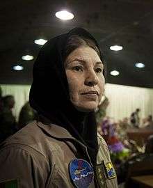 The first female Air Force helicopter pilot in Afghanistan’s history Col. Latifa Nabizada exits the stage after speaking at an Afghan Air Force International Women’s Day celebration at Kabul International Airport, March 07, 2013.