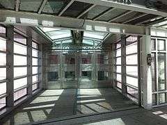 Entrance from inside the pedestrian bridge at West and Chambers Street