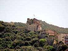 Ruins of  stone castle on a hillside