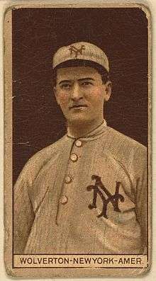 A baseball card image of a man wearing an old-style white baseball uniform and cap with an interlocking "NY" on both