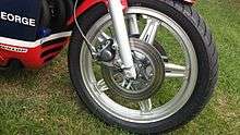 Silver Comstar wheel on an Honda RCB endurance race bike