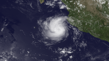 A visible satellite image of a small yet well-developed hurricane in the open East Pacific on July 2.
