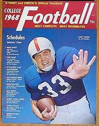 Color rendering of 1968 cover of Street & Smith magazine, showing a close-up of football player Larry Smith in the royal blue, white and orange uniform of the Florida Gators, carrying a football in one hand with the other outstretched toward the camera.