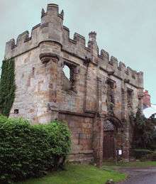 ruined building in reddish sandstone