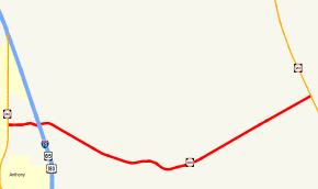 Highways east of Anthony are shown on a map. NM 404 is highlighted in red, running east to west for 9.7 miles from NM 460 in Anthony to NM 213 outside of Chaparral.