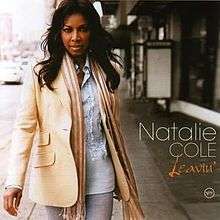 A woman in a jacket and jeans is shown walking toward the camera. The words Natalie Cole are shown in the right lower-hand corner in a white font along with the word Leavin' in an orange, cursive font.