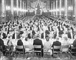 Black-and-white photo of large banquet