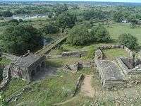 A view of the fort from the top showing fort walls and a moat