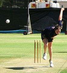 Rene Farrell bowling in training