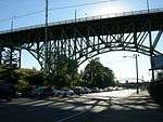 A steel bridge over a roadway