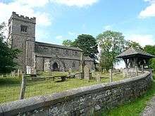 A church with a battlemented west tower