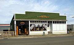 Photograph of a one-story storefront