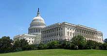 White US Capitol building with rotunda.